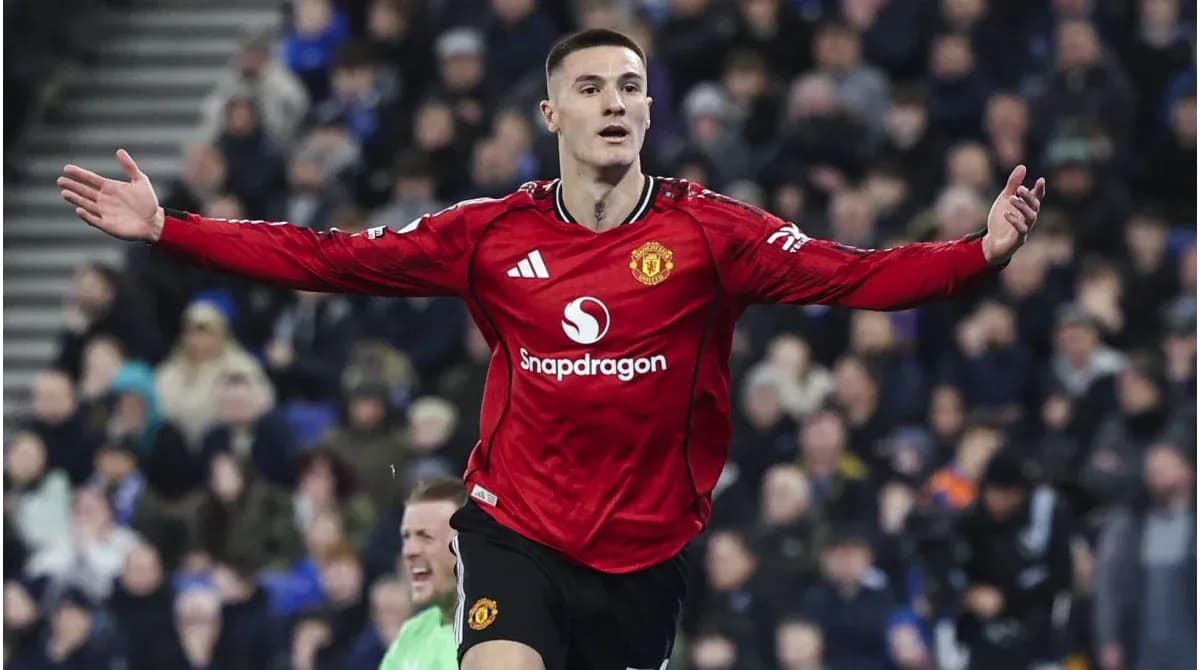 Player celebrating after scoring a goal for Manchester United Player celebrating after scoring a goal for Manchester United