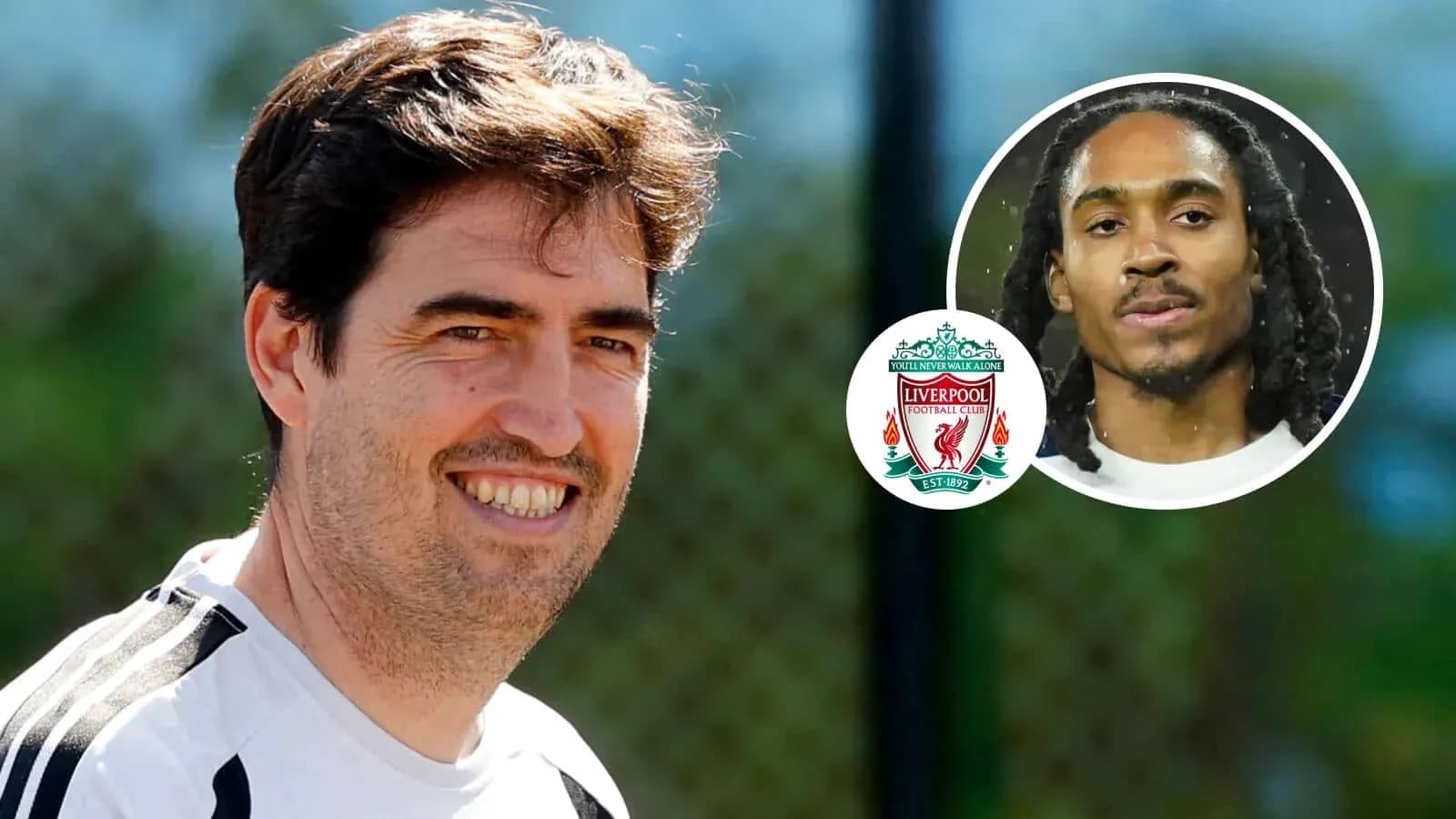 Coach smiling during training session with Liverpool logo Coach smiling during training session with Liverpool logo