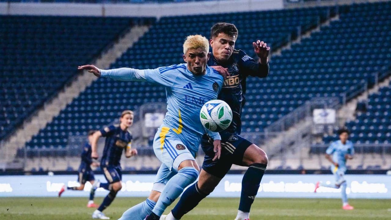 Philadelphia Union II player challenging Atlanta United II Philadelphia Union II player challenging Atlanta United II