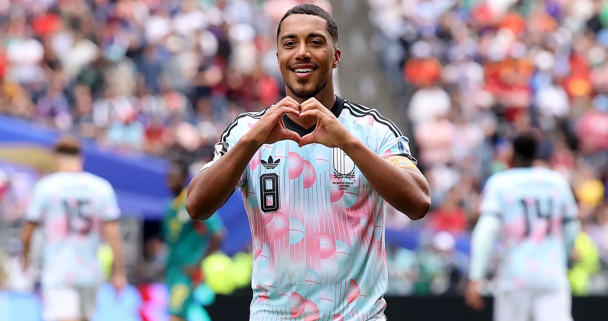 Player celebrating and making heart shape gesture Player celebrating and making heart shape gesture