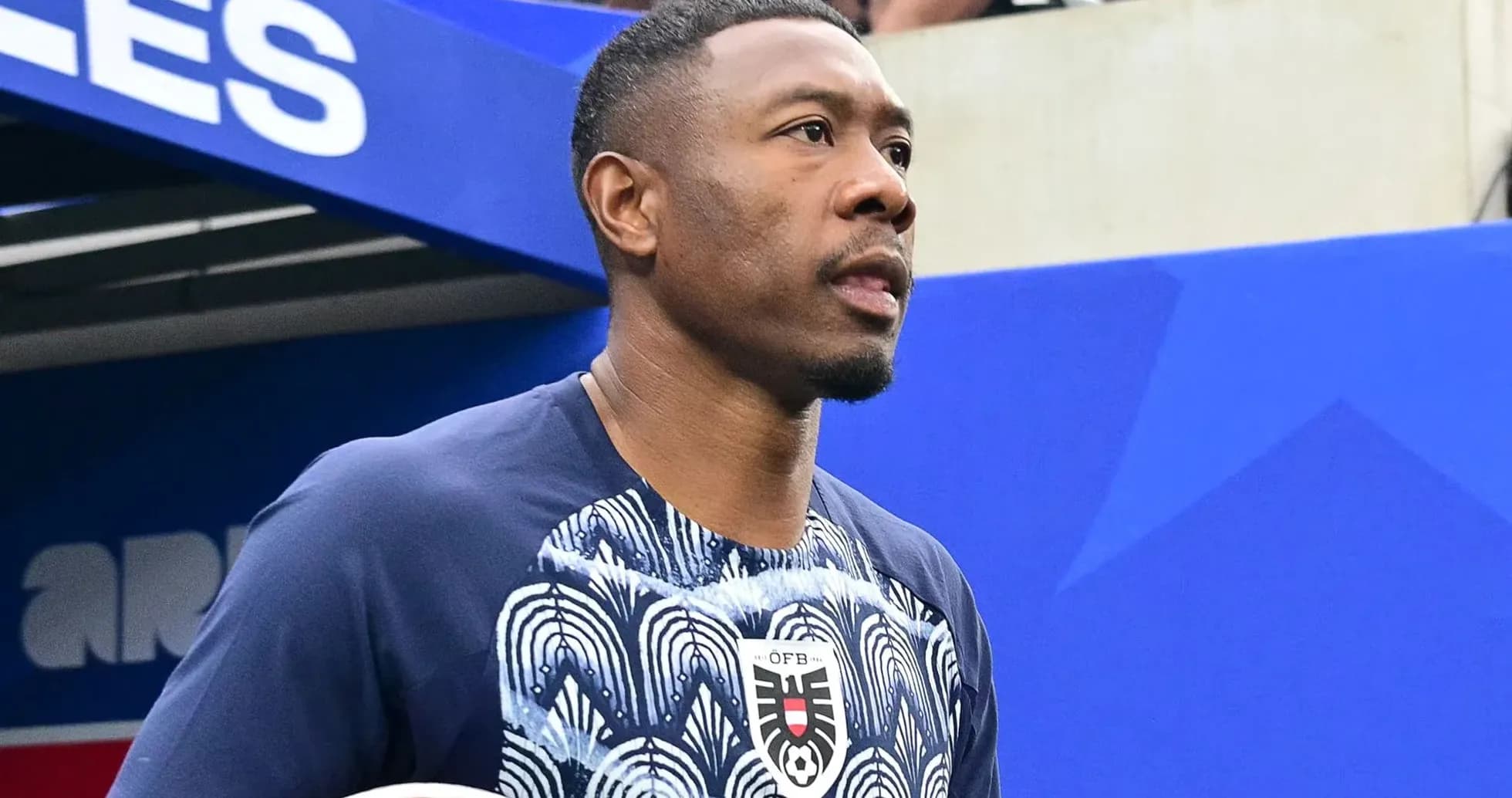 Player walking onto the pitch before the match Player walking onto the pitch before the match