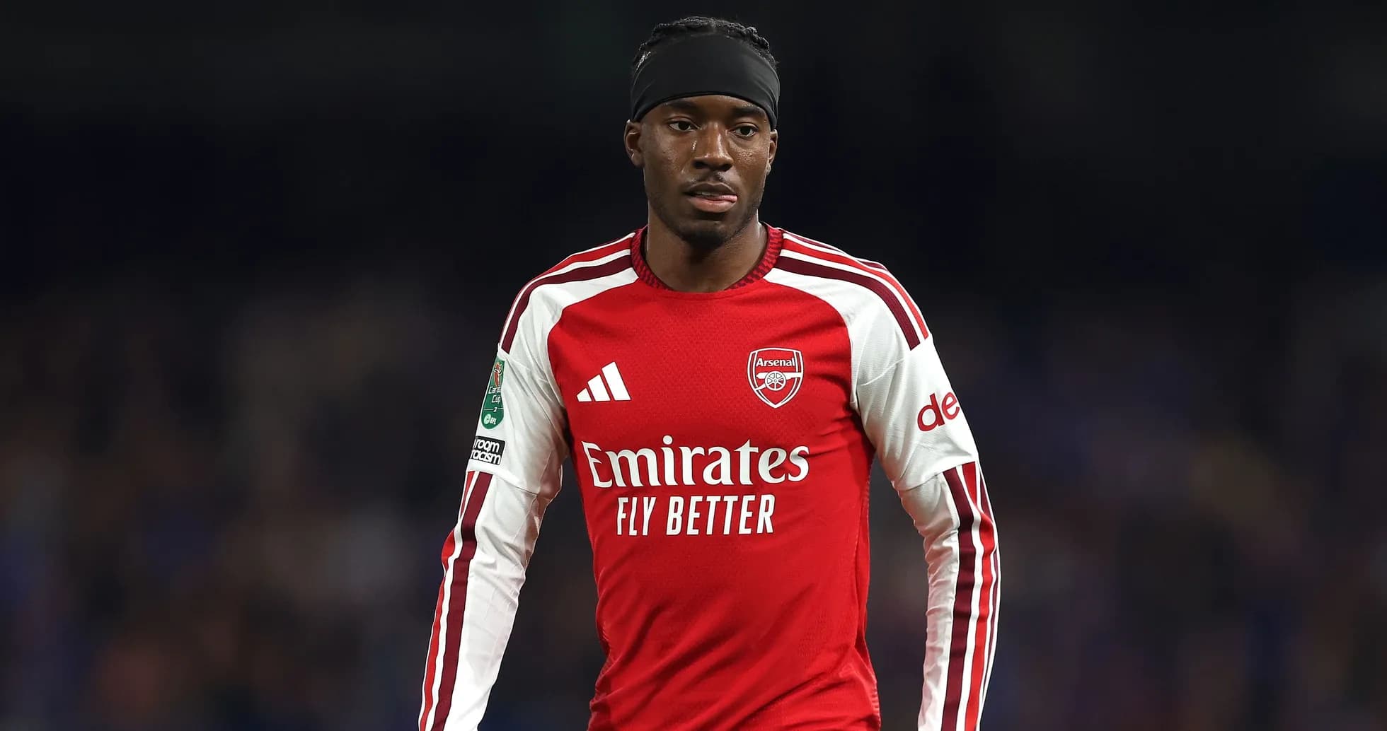 Player in Arsenal kit during match action Player in Arsenal kit during match action