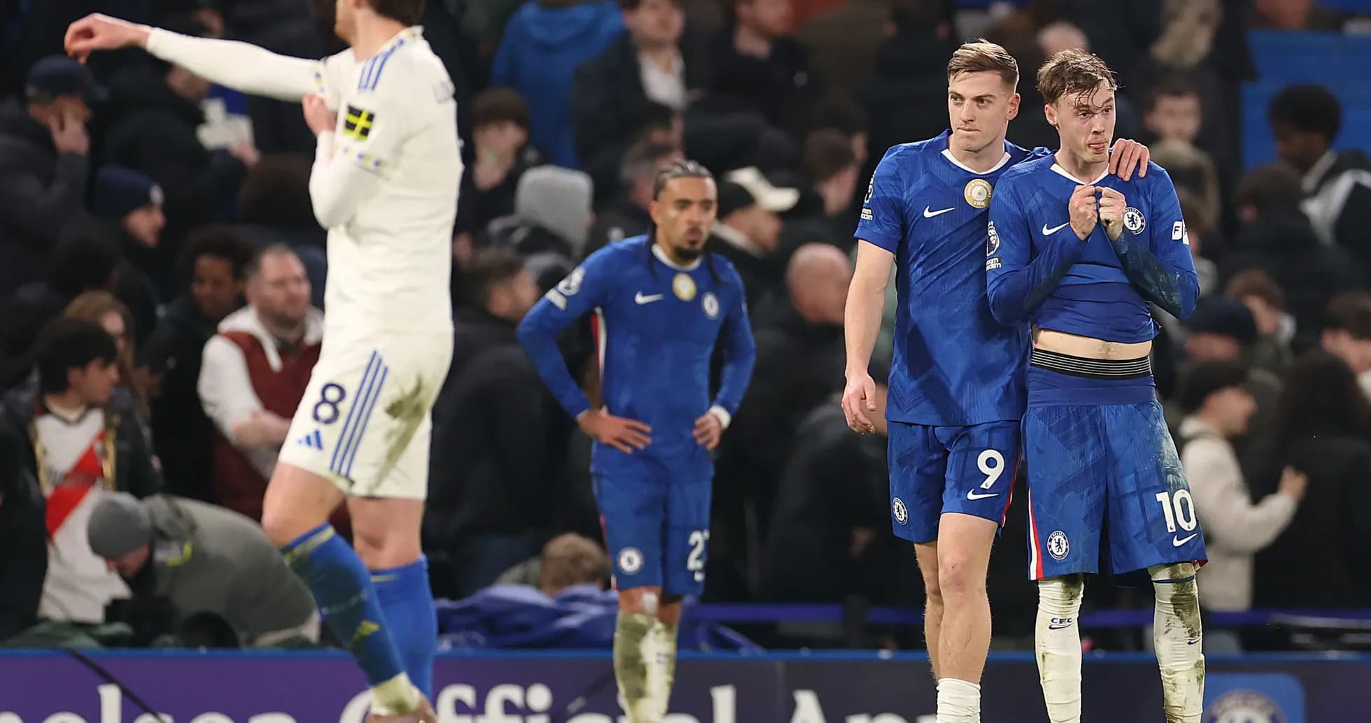 Chelsea players walking off the pitch after a match Chelsea players walking off the pitch after a match
