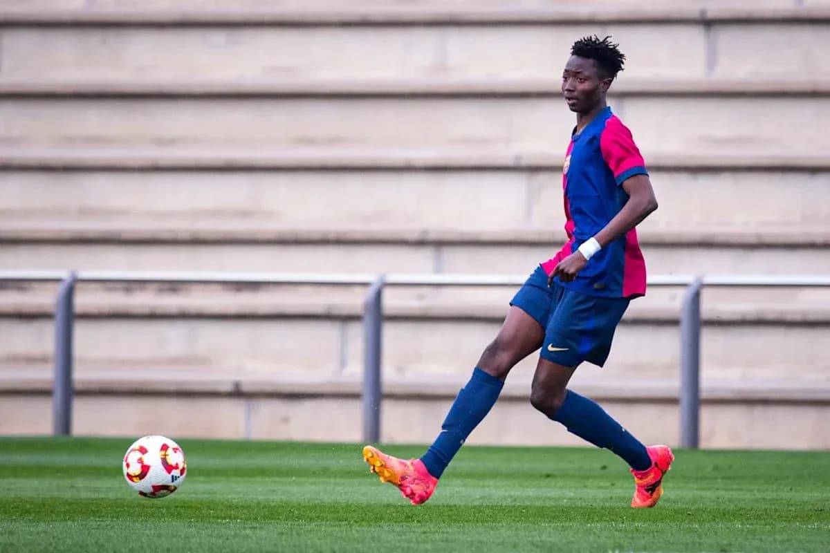 Player in FC Barcelona kit controlling a soccer ball Player in FC Barcelona kit controlling a soccer ball