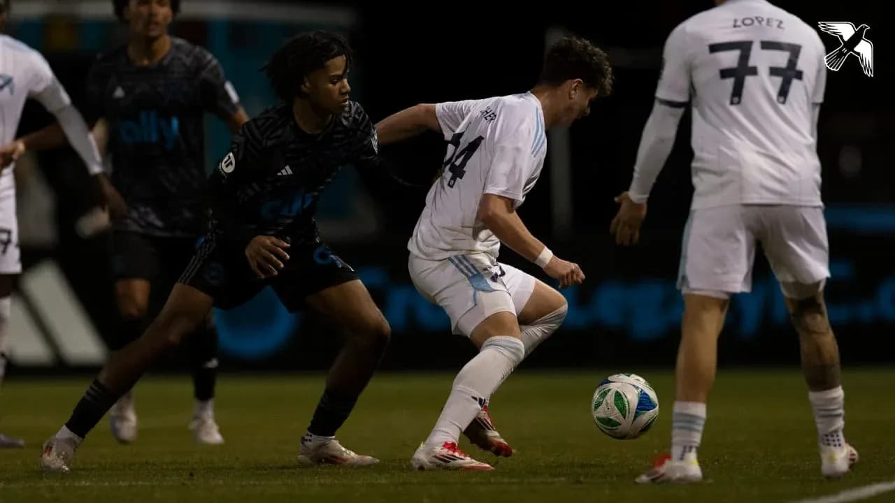 Crown Legacy player dribbling against New York City II Crown Legacy player dribbling against New York City II