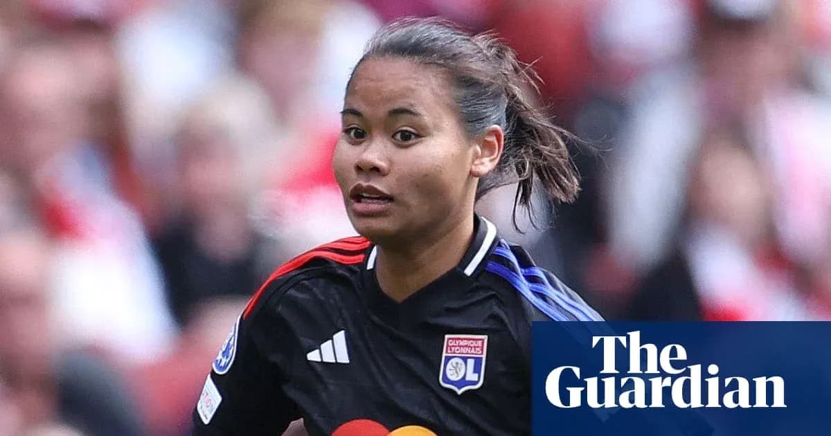 Player running during a match for Lyon Player running during a match for Lyon