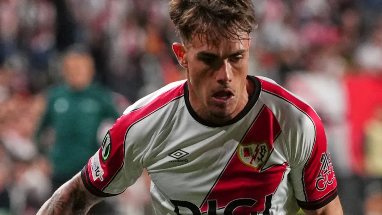 Player in Rayo Vallecano kit during match action Player in Rayo Vallecano kit during match action