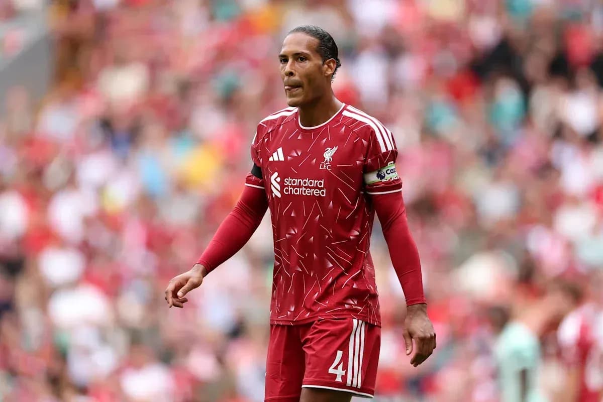 Liverpool player walking on the pitch during match Liverpool player walking on the pitch during match