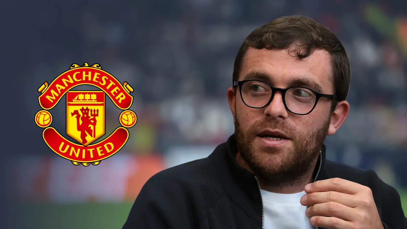 Person discussing Manchester United with logo in background Person discussing Manchester United with logo in background