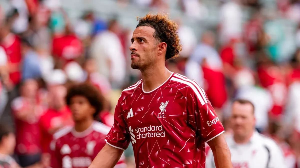 Player walking off field in Liverpool jersey Player walking off field in Liverpool jersey