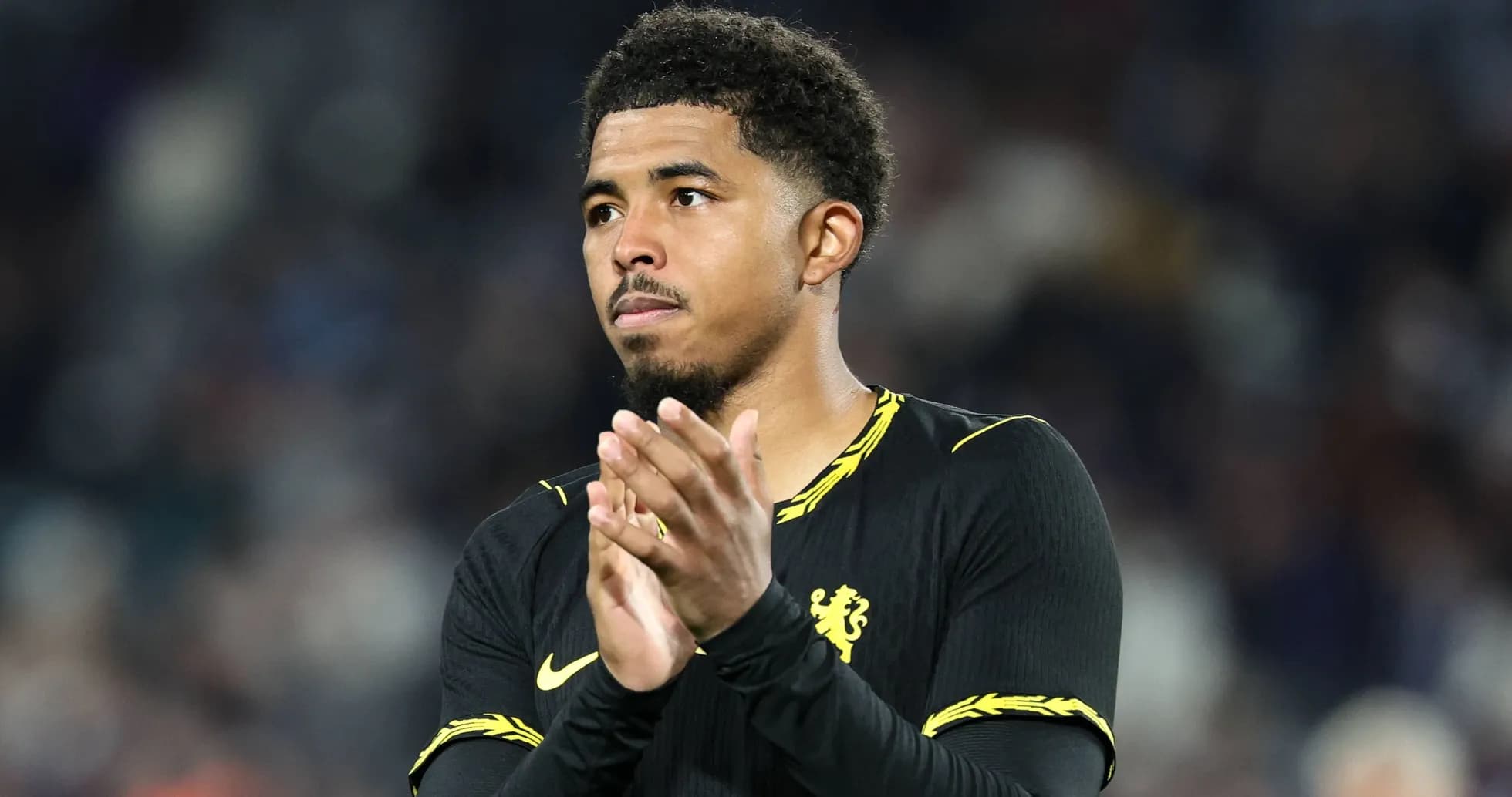 Player applauding fans after the match Player applauding fans after the match