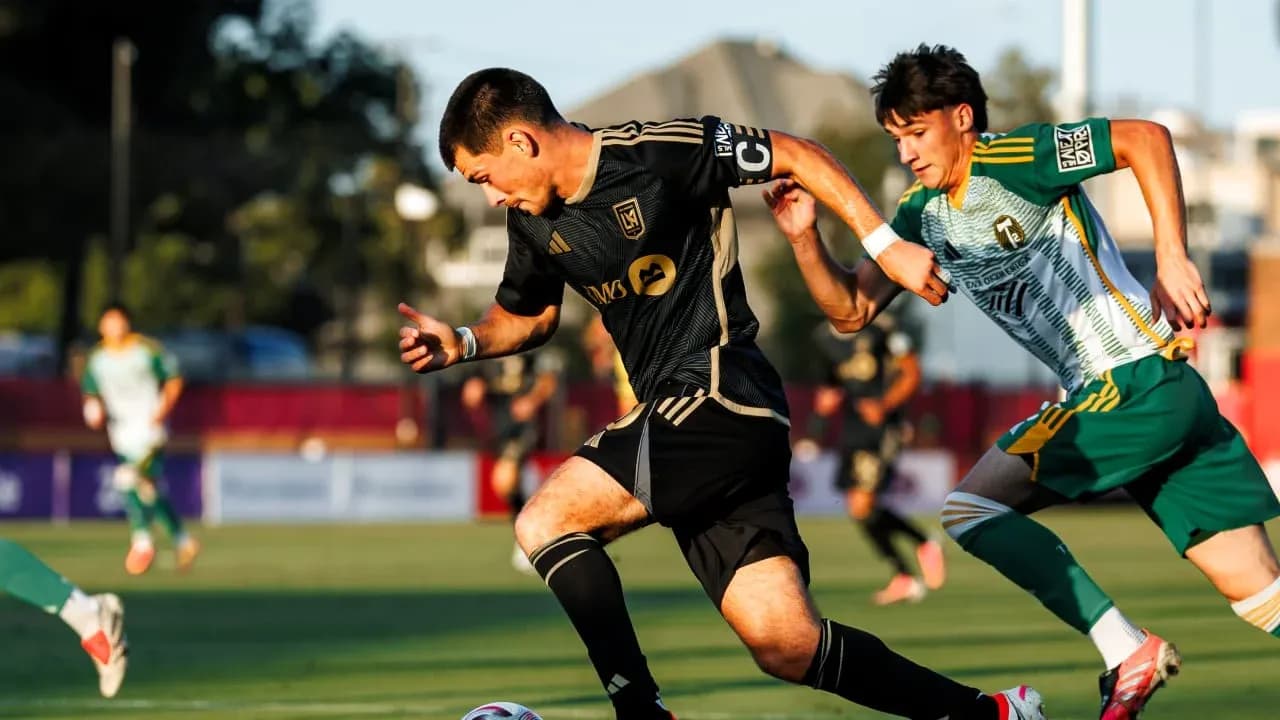 Player dribbling the ball during MLS Next Pro match Player dribbling the ball during MLS Next Pro match