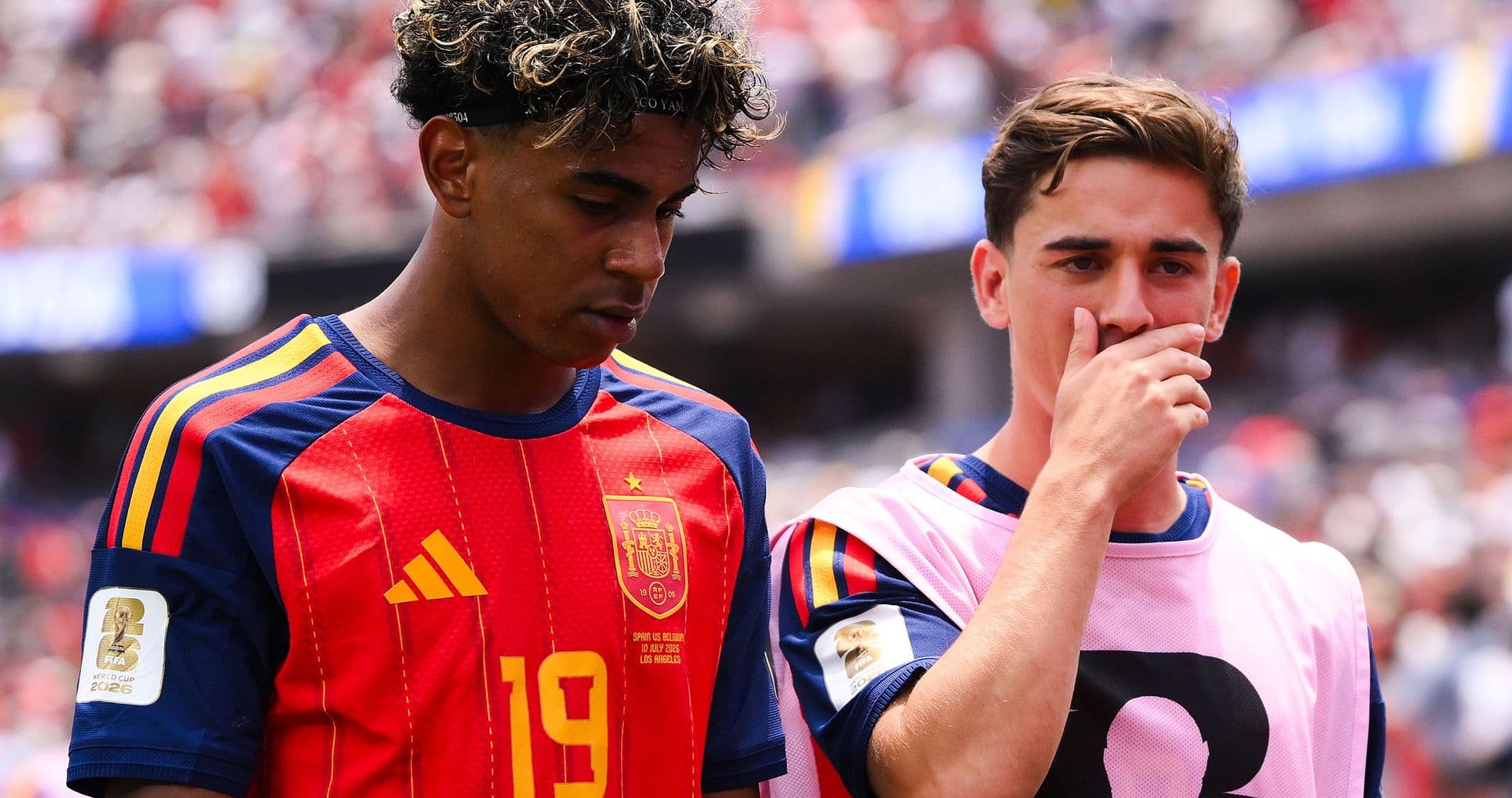 Two Spain players on sidelines during match Two Spain players on sidelines during match