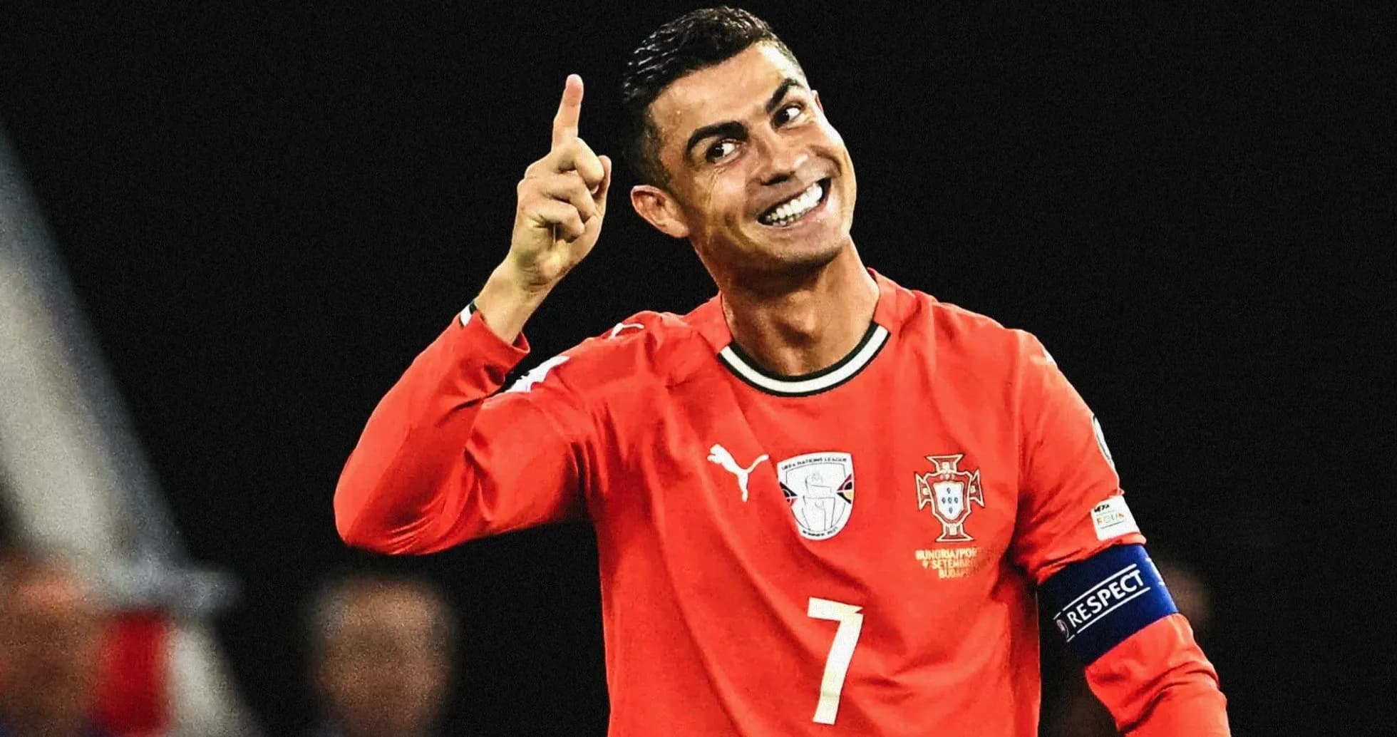 Player celebrating with finger raised during match Player celebrating with finger raised during match