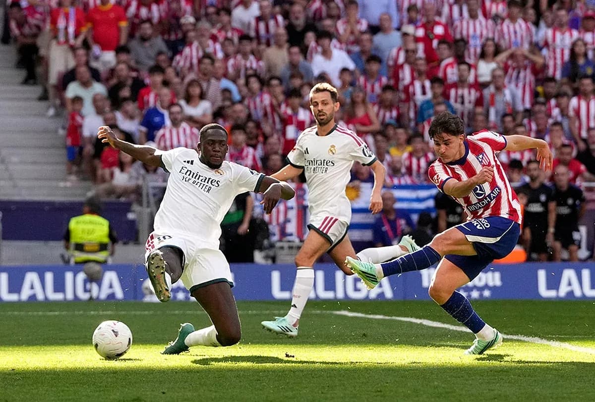 Atletico player shooting during Madrid derby Atletico player shooting during Madrid derby
