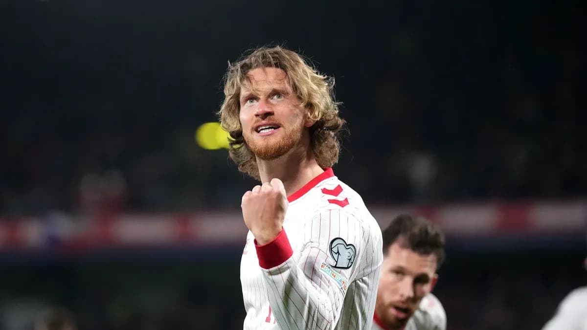 Player celebrating with clenched fist during match Player celebrating with clenched fist during match