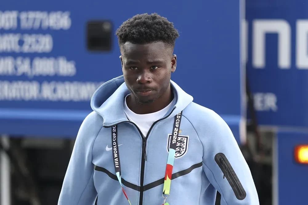 Player arriving at venue wearing team training gear Player arriving at venue wearing team training gear