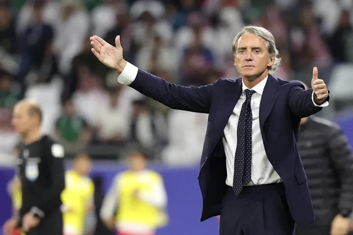 Coach gesturing during a football match on the sideline Coach gesturing during a football match on the sideline