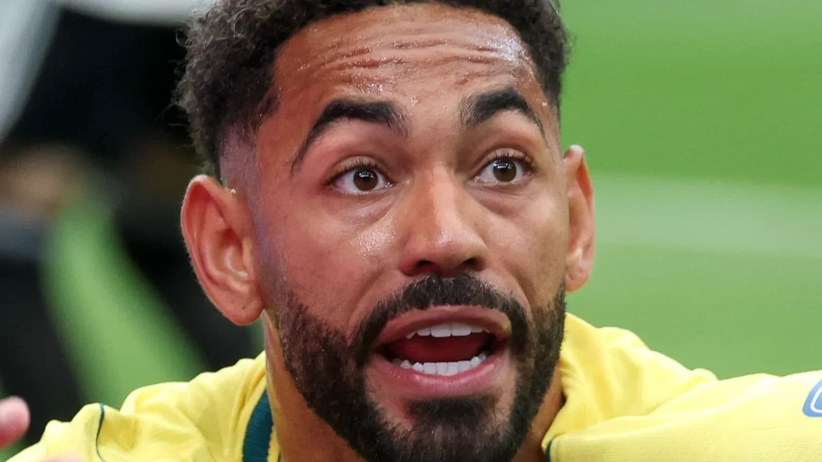 Player expressing intensity during match celebration Player expressing intensity during match celebration