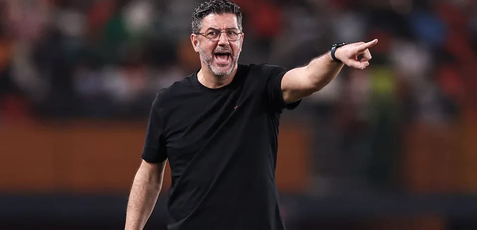 Coach gesturing and giving instructions during match Coach gesturing and giving instructions during match
