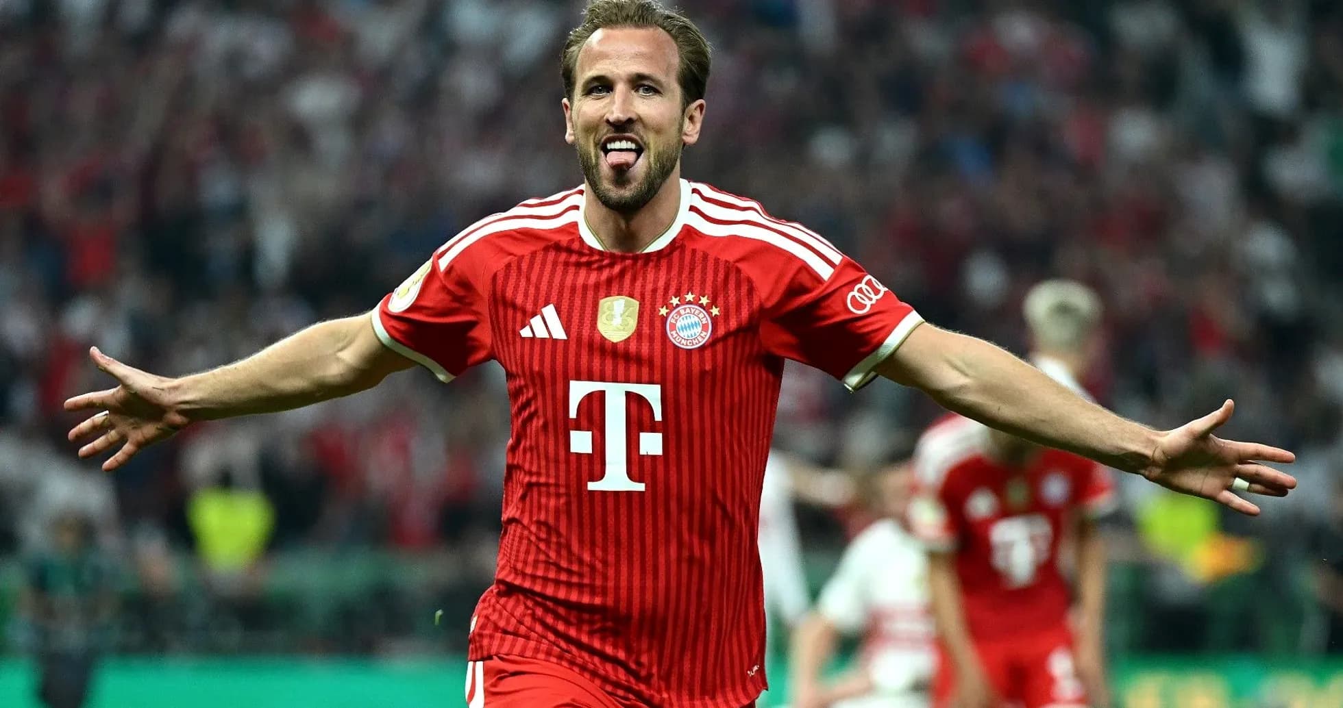 Player celebrating after scoring a goal for Bayern Munich Player celebrating after scoring a goal for Bayern Munich