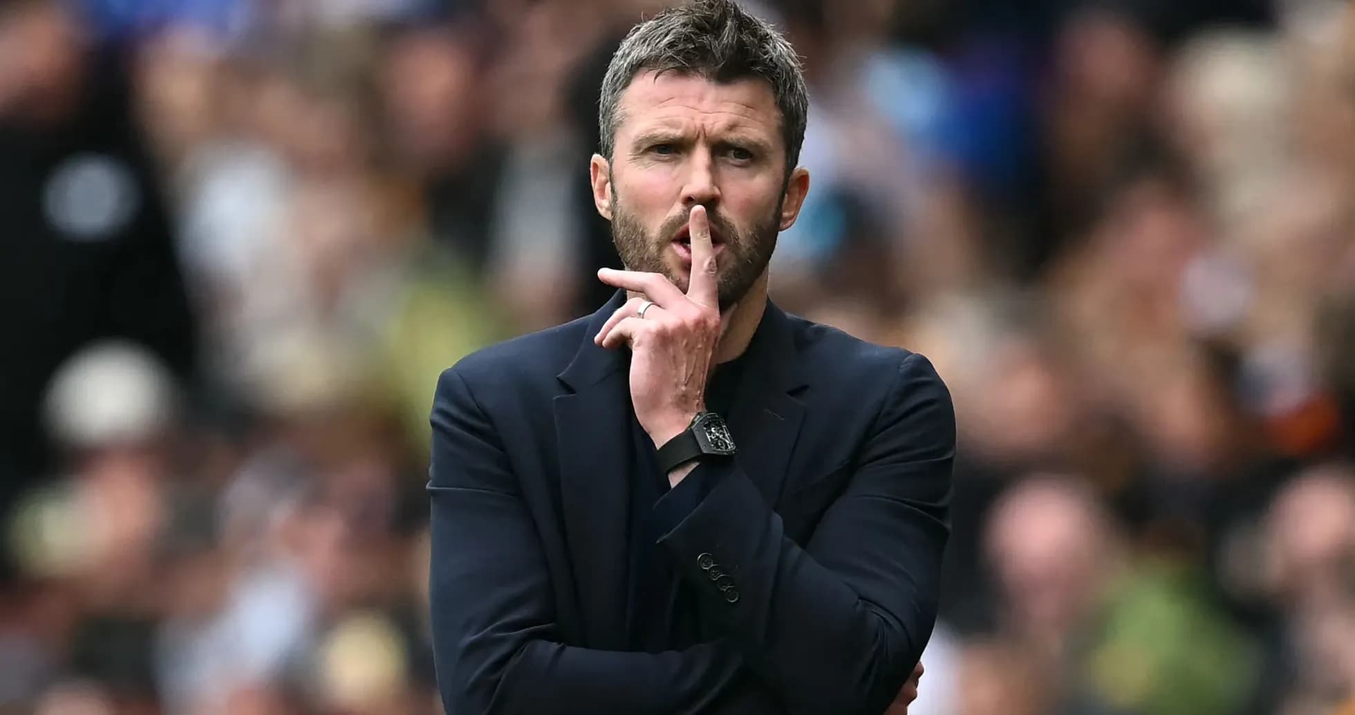 Coach gesturing for silence during match Coach gesturing for silence during match
