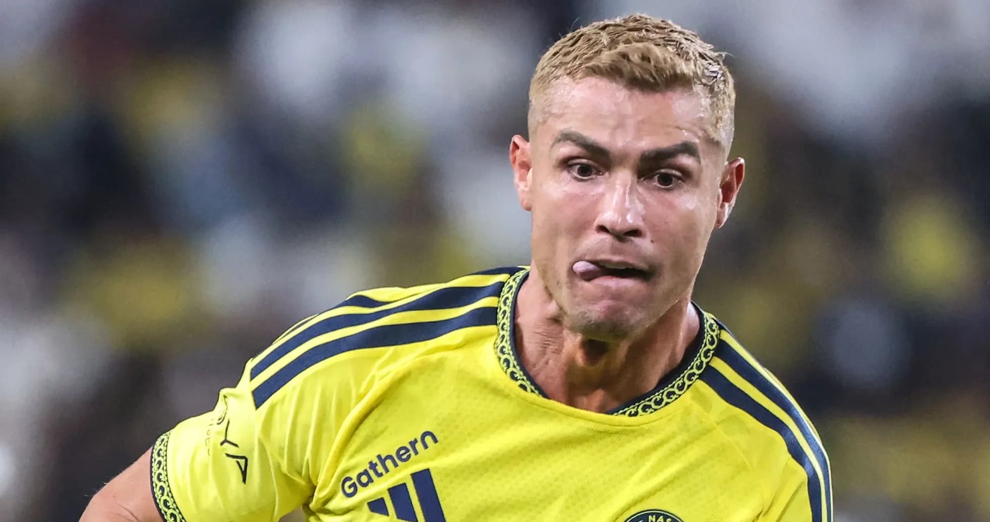 Player sprinting in yellow jersey during match Player sprinting in yellow jersey during match