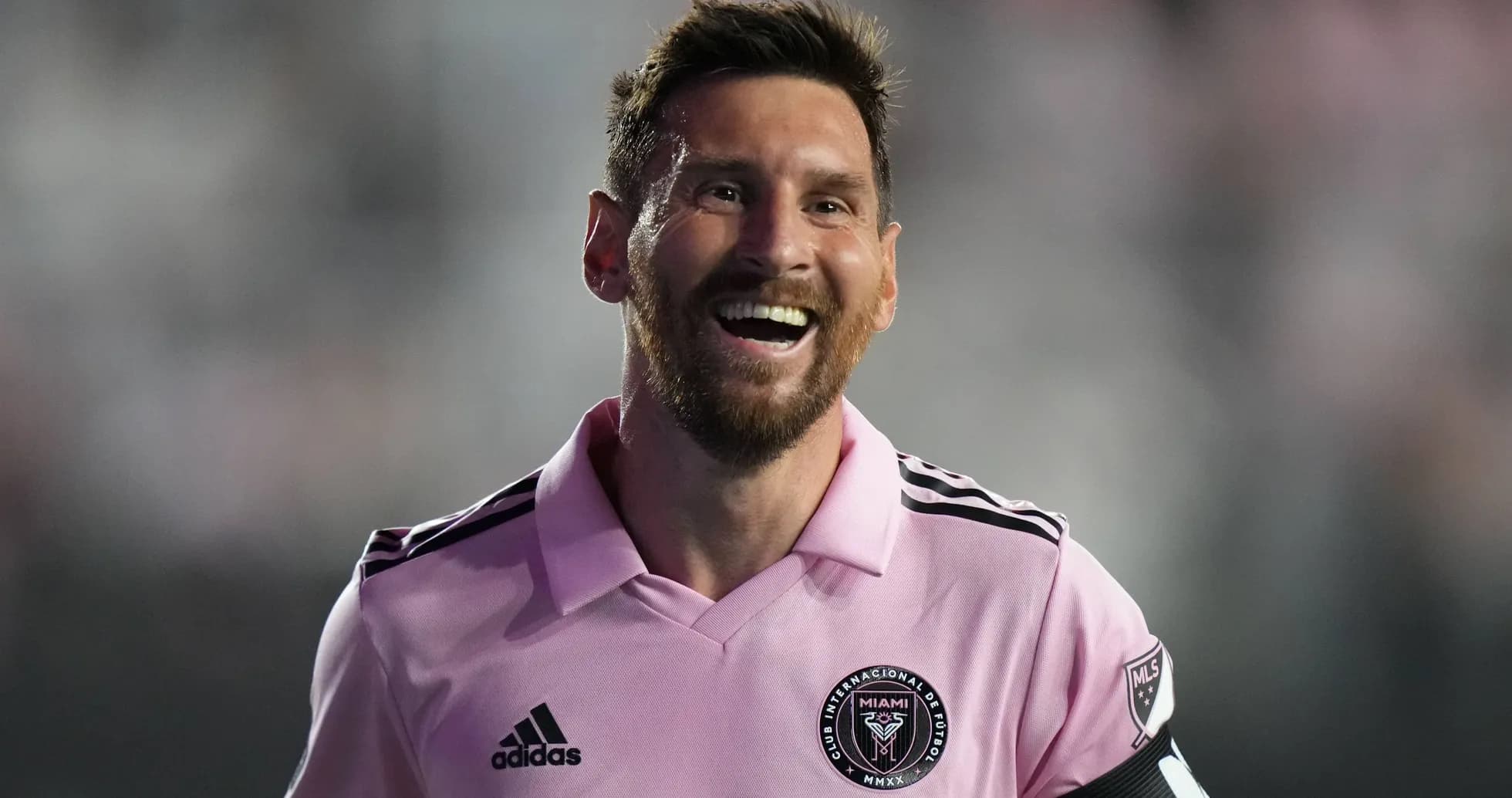 Player smiling in pink jersey during match Player smiling in pink jersey during match