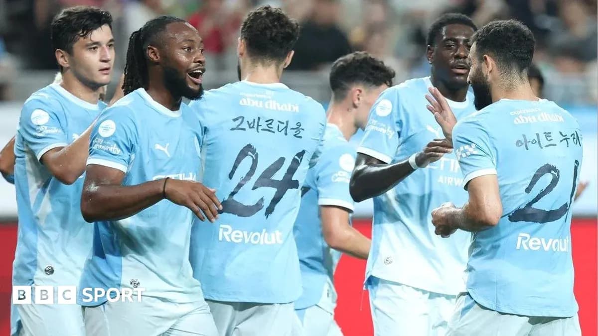 Players celebrating together during a football match Players celebrating together during a football match