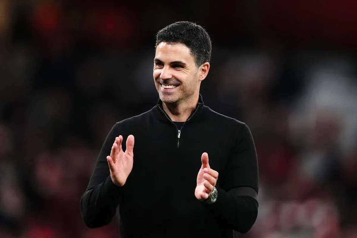 Manager applauding during a match at the stadium Manager applauding during a match at the stadium