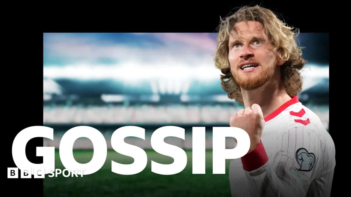 Player celebrating on the pitch with clenched fist Player celebrating on the pitch with clenched fist