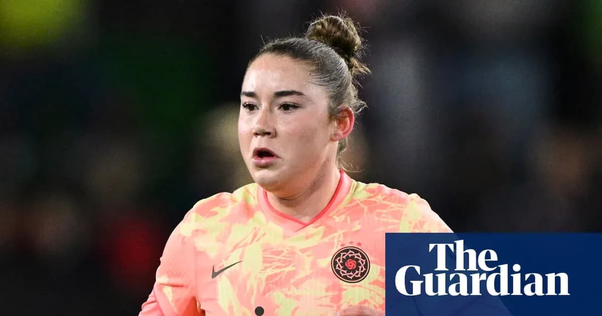 Goalkeeper in bright jersey during a match Goalkeeper in bright jersey during a match