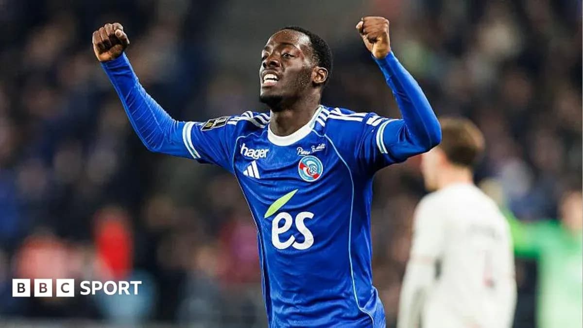 Player celebrating a goal in blue jersey Player celebrating a goal in blue jersey