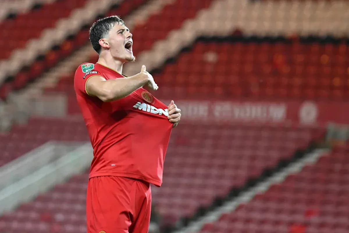 Player celebrating by lifting shirt after scoring goal Player celebrating by lifting shirt after scoring goal