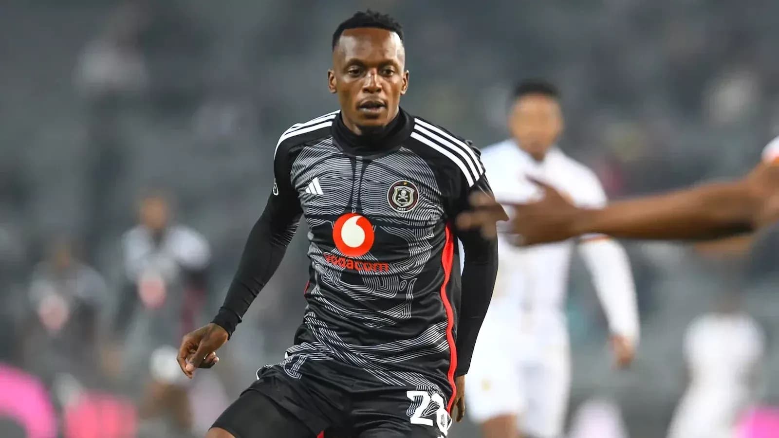 Player in action during a football match Player in action during a football match