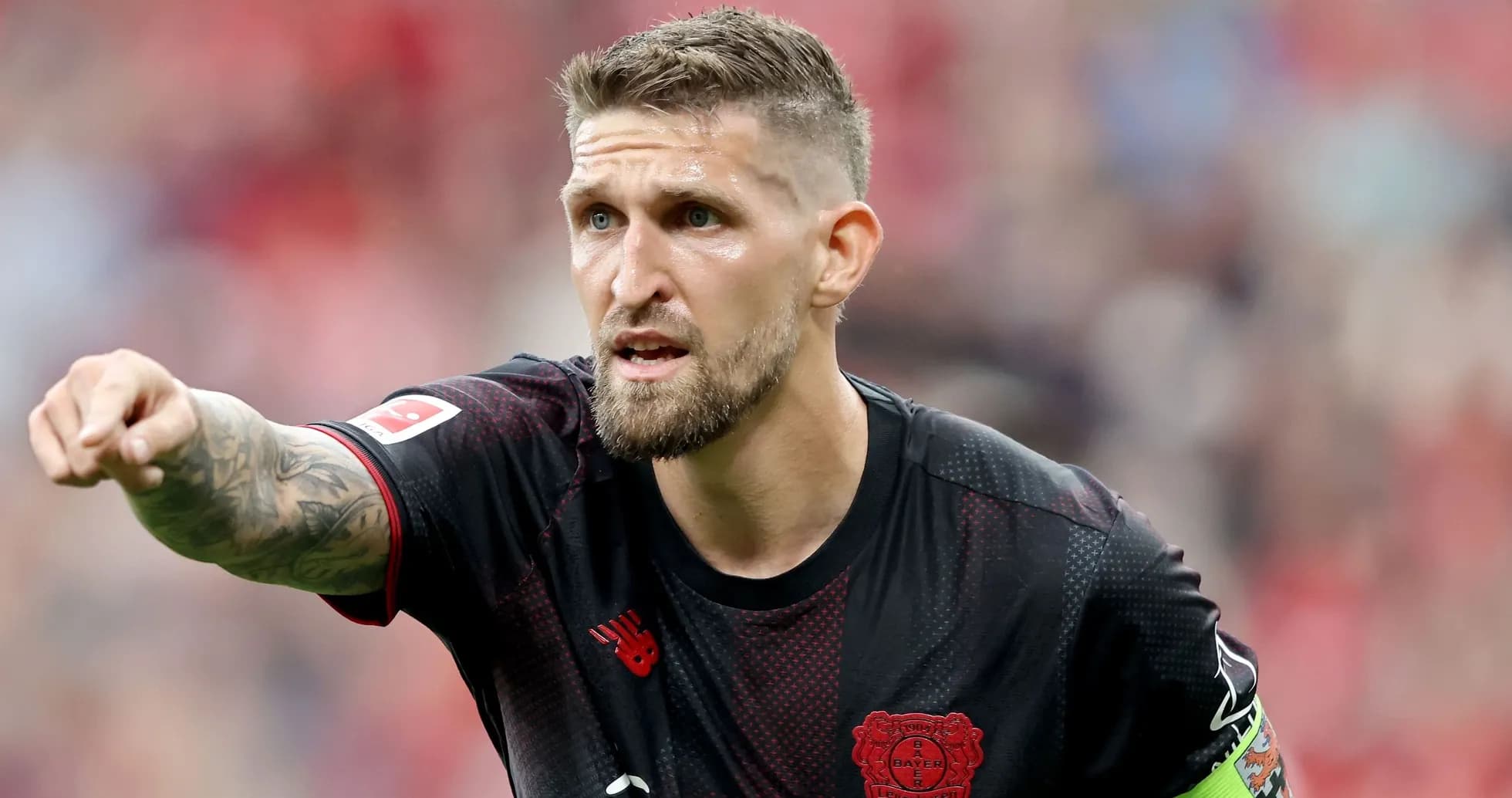 Player gesturing during a match for Bayer Leverkusen Player gesturing during a match for Bayer Leverkusen