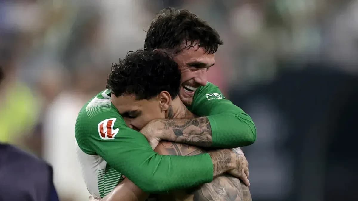 Two players embracing after a match victory Two players embracing after a match victory