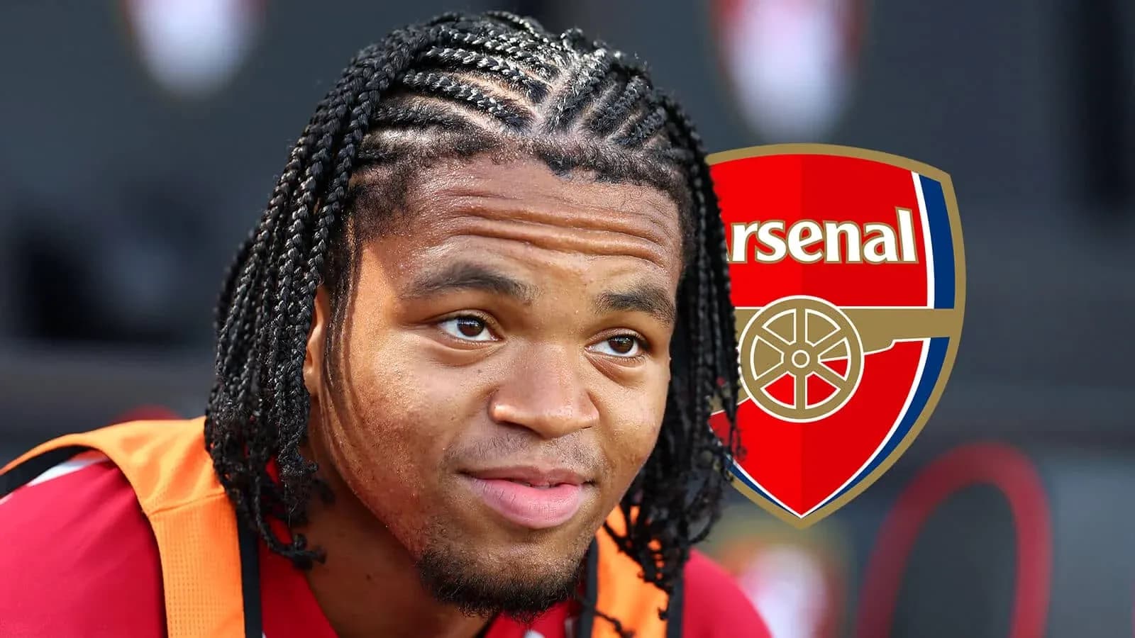 Player with braided hair and Arsenal logo backdrop Player with braided hair and Arsenal logo backdrop