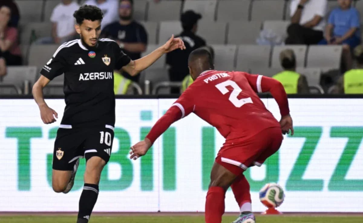 CSKA Sofia player tackling Qarabag opponent CSKA Sofia player tackling Qarabag opponent