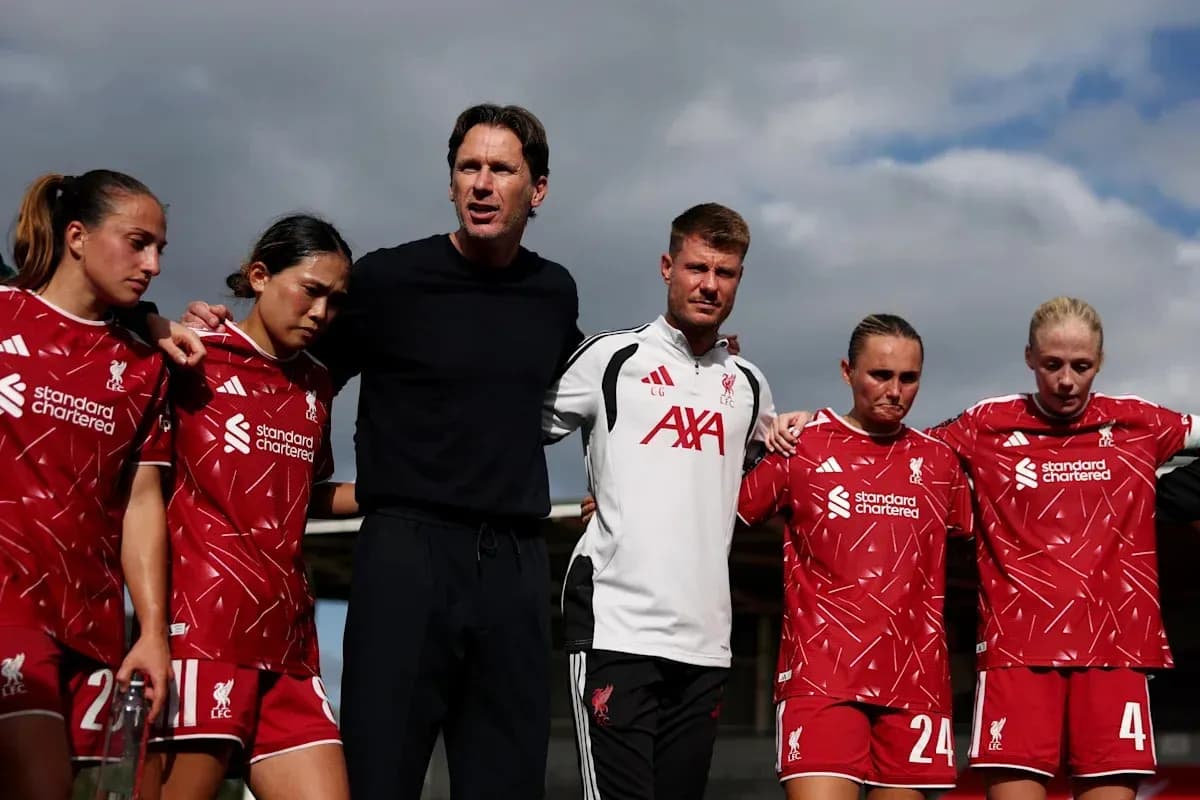 Liverpool women's team huddling with coaching staff Liverpool women's team huddling with coaching staff