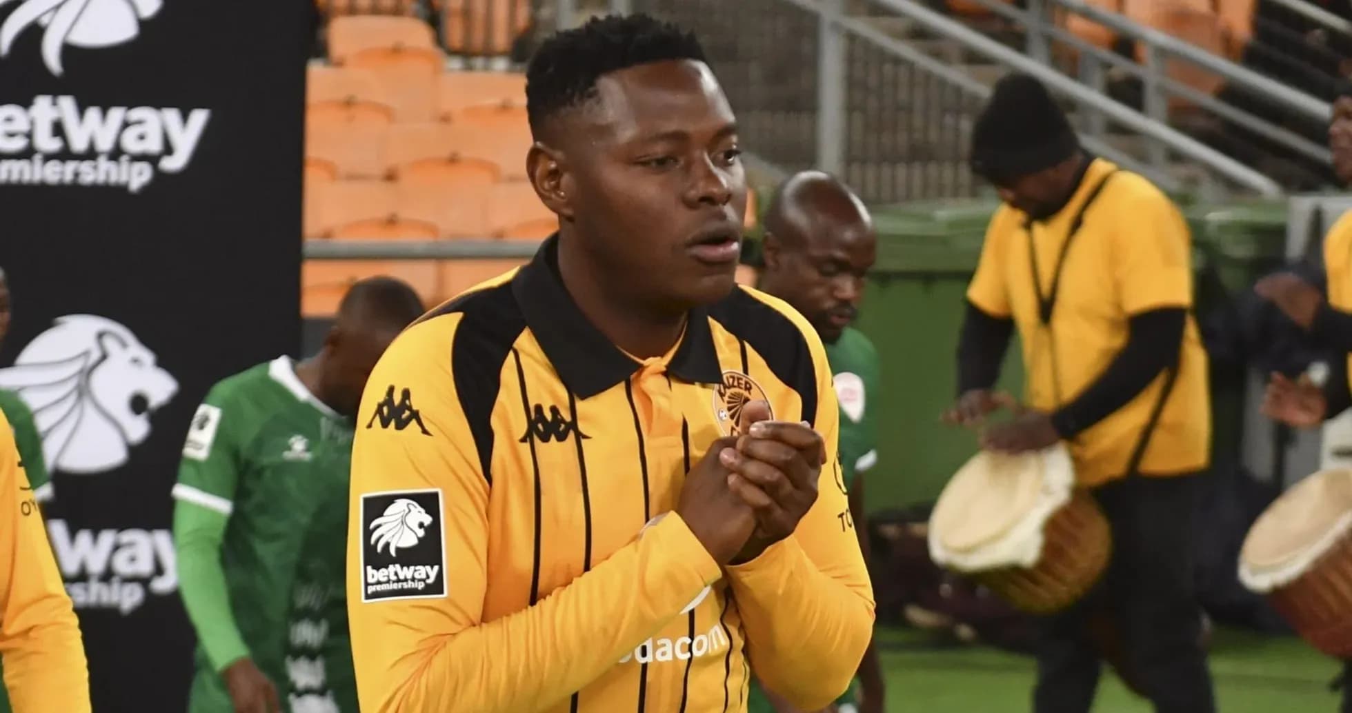 Player in yellow jersey walking onto the field Player in yellow jersey walking onto the field