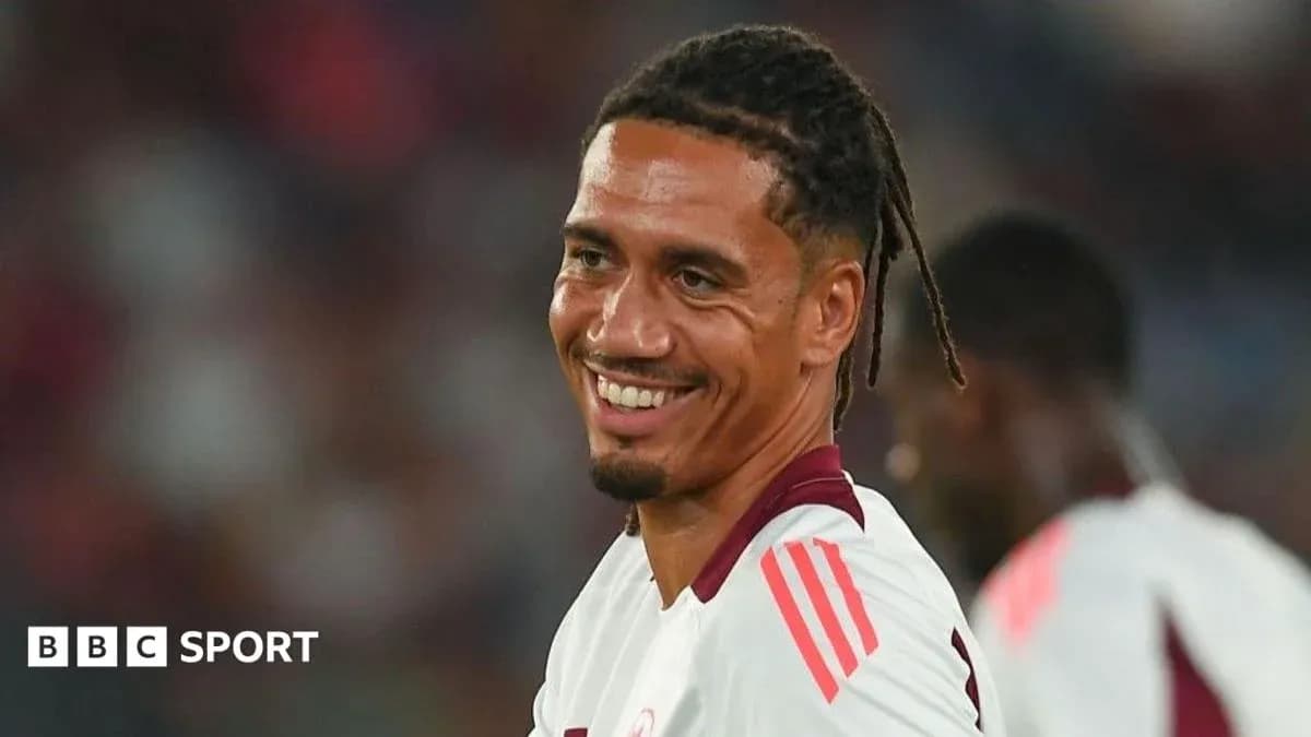 Player smiling during a football match Player smiling during a football match