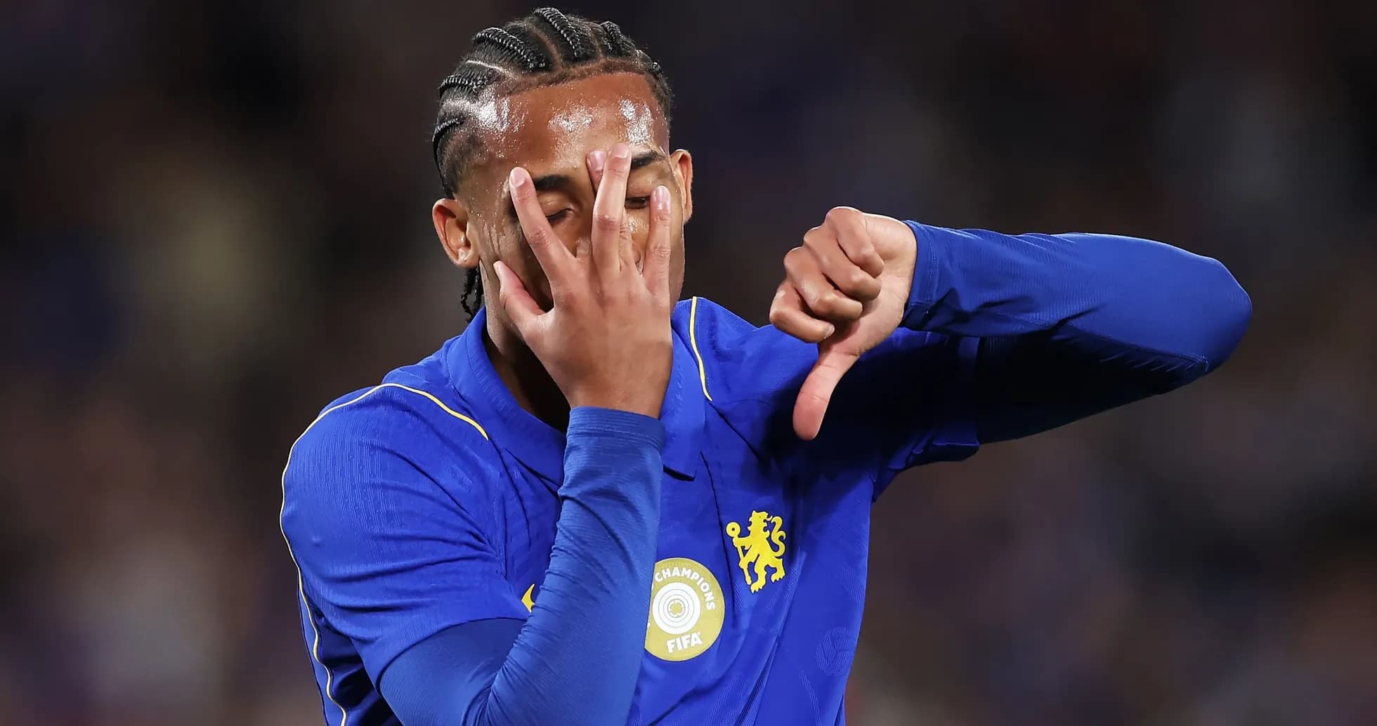 Player showing disappointment during match celebration Player showing disappointment during match celebration