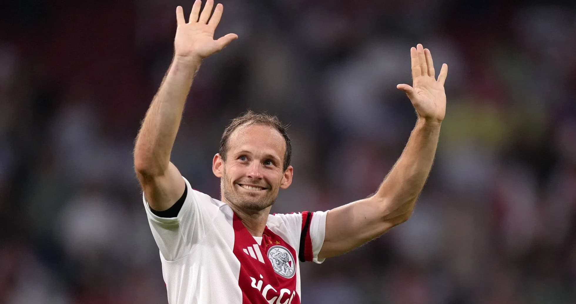 Player waving to fans during a match Player waving to fans during a match