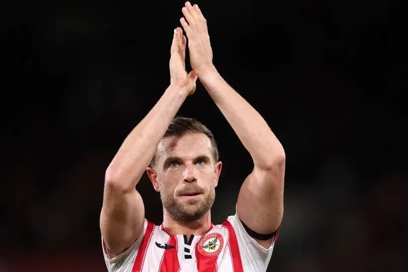Player applauding fans after match conclusion Player applauding fans after match conclusion