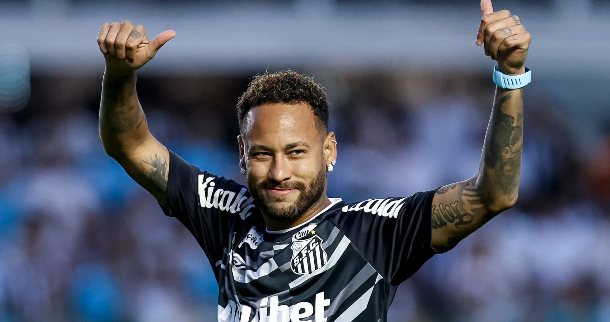Player celebrating with thumbs up during match Player celebrating with thumbs up during match
