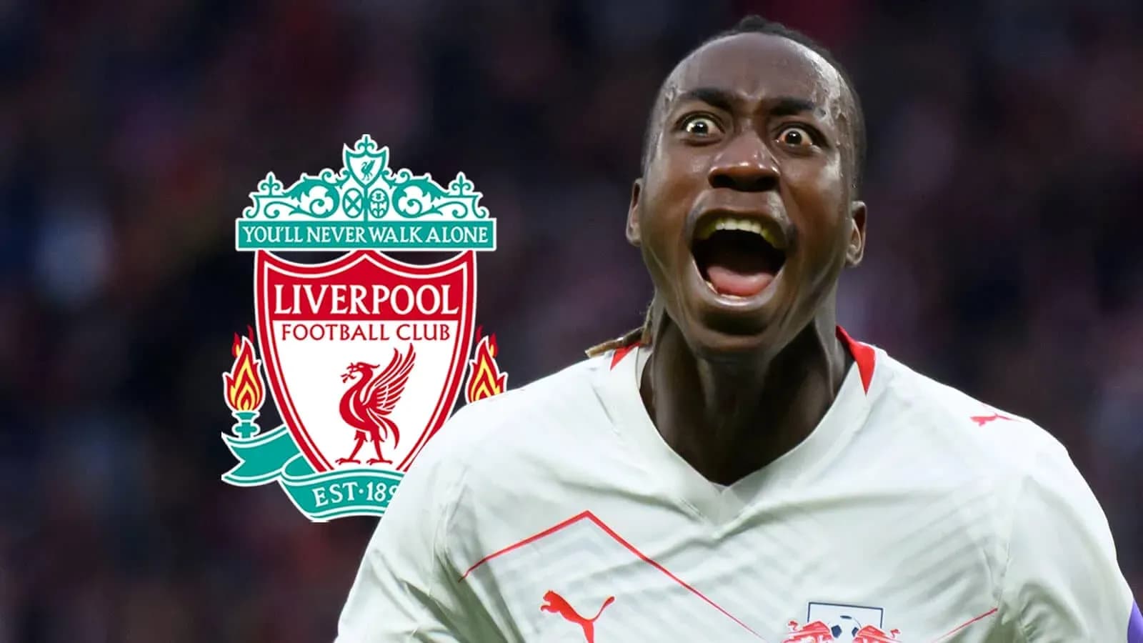Player celebrating with Liverpool logo in background Player celebrating with Liverpool logo in background