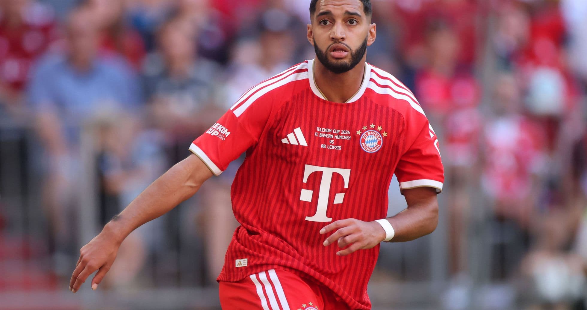 Player in Bayern Munich kit running during match Player in Bayern Munich kit running during match