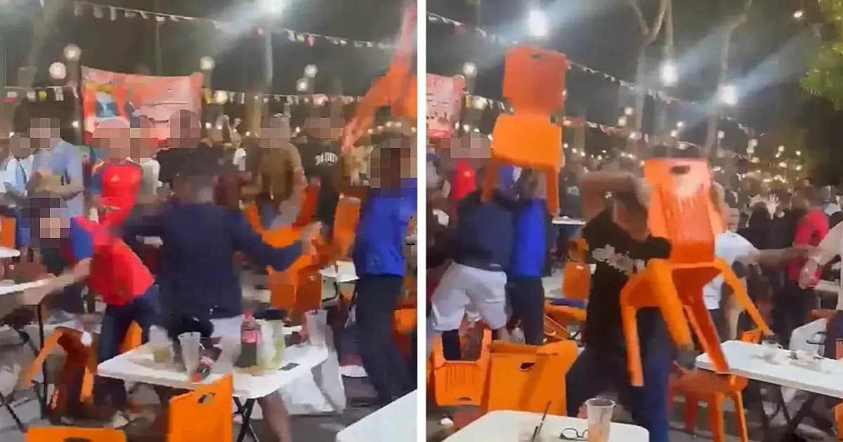 Crowd throwing chairs during a chaotic event Crowd throwing chairs during a chaotic event
