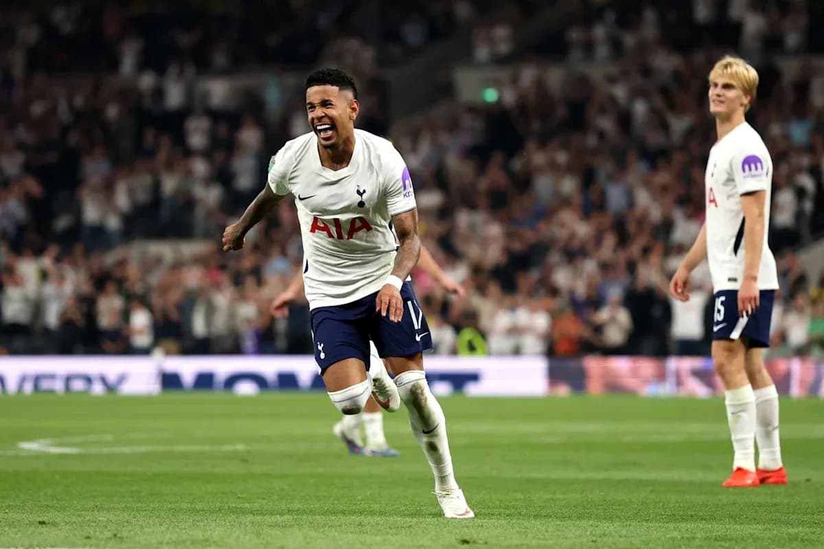 Tottenham player celebrating goal on the pitch Tottenham player celebrating goal on the pitch